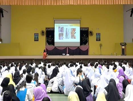 Sister Swinder gives a talk on the dangers of smoking to students